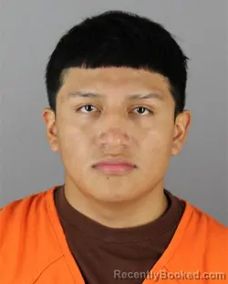 Mugshot of Denis Joel Olivares  Caiza booked in Hennepin County, Minnesota on October 2, 2026