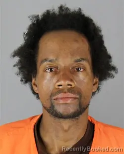 Mugshot of Dominique Lionel Greenhow booked in Hennepin County, Minnesota on October 2, 2026