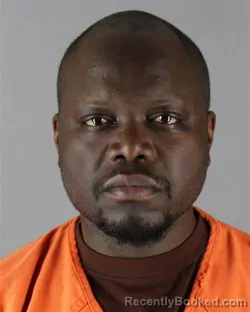 Mugshot of Henry Nyanja booked in Hennepin County, Minnesota on October 2, 2026