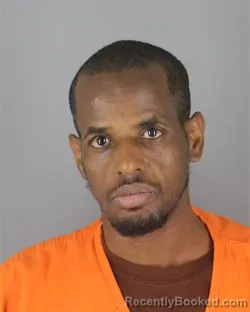 Mugshot of Bashir Dahir Abdi booked in Hennepin County, Minnesota on October 3, 2026