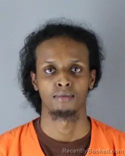 Mugshot of Cadnaan Mohamed Deeq booked in Hennepin County, Minnesota on October 3, 2026