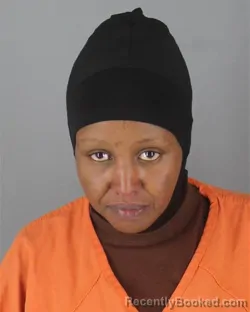 Mugshot of Muna Abdisalan Warsame booked in Hennepin County, Minnesota on October 3, 2026