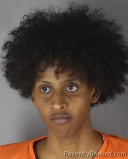 Mugshot of Abdinajib Ismail Abdi booked in Hennepin County, Minnesota on October 3, 2026