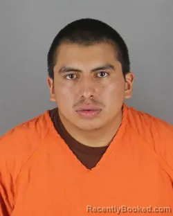 Mugshot of Edwin Javier Naula Rodriguez booked in Hennepin County, Minnesota on October 4, 2026