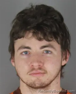 Mugshot of Hunter William Taunton booked in Hennepin County, Minnesota on October 4, 2026