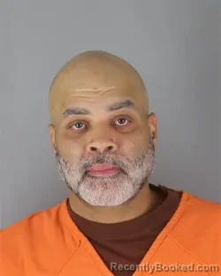 Mugshot of Kofi Abubakar Bain booked in Hennepin County, Minnesota on October 4, 2026