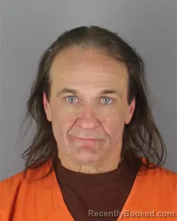 Mugshot of Jeffrey Lee Sample booked in Hennepin County, Minnesota on October 4, 2026