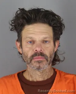 Mugshot of Justan Joseph Kellogg booked in Hennepin County, Minnesota on October 5, 2026