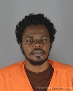 Mugshot of Abdiqani Ahmed Hassan booked in Hennepin County, Minnesota on October 5, 2026