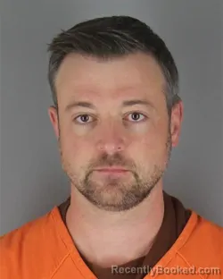 Mugshot of Mathew Brian Ignatius Warnert booked in Hennepin County, Minnesota on October 5, 2026