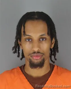 Mugshot of Anas Abdihakim Ali booked in Hennepin County, Minnesota on October 5, 2026