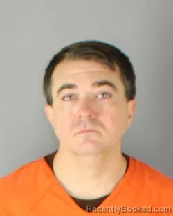 Mugshot of Brent Jeffrey Adams booked in Hennepin County, Minnesota on October 6, 2026