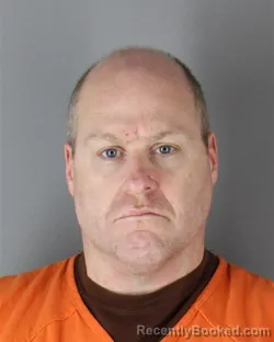 Mugshot of Richard Robert Radoush booked in Hennepin County, Minnesota on October 6, 2026