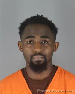 Mugshot of Aggrey Sibwoga Mokaya booked in Hennepin County, Minnesota on October 6, 2026
