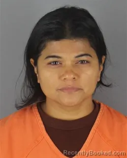 Mugshot of Jessenia Elizabeth Zuniga Vega booked in Hennepin County, Minnesota on October 6, 2026