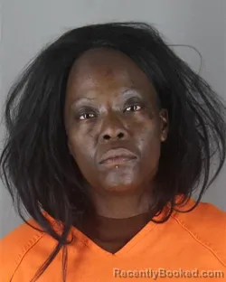 Mugshot of Lois Dominique Smith booked in Hennepin County, Minnesota on October 6, 2026