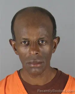 Mugshot of Asad Mohamud Omar booked in Hennepin County, Minnesota on October 7, 2026