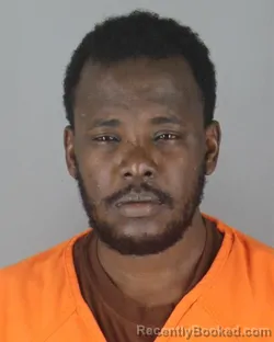 Mugshot of Jama H Osman booked in Hennepin County, Minnesota on October 7, 2026