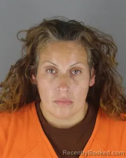 Mugshot of Annette Yolanda Hernandez booked in Hennepin County, Minnesota on October 7, 2026