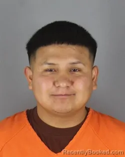 Mugshot of Abraham Leonidas Zhagui Sinchi booked in Hennepin County, Minnesota on October 7, 2026
