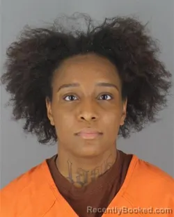 Mugshot of Rizae Ann Colenda Larae Robinson booked in Hennepin County, Minnesota on October 7, 2026
