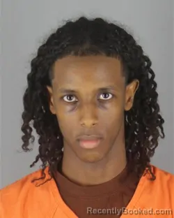 Mugshot of Imraan Mohamed Isaack booked in Hennepin County, Minnesota on October 7, 2026