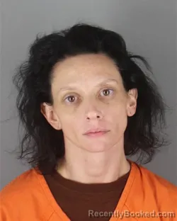 Mugshot of Nicole Marie Ruud booked in Hennepin County, Minnesota on October 7, 2026