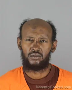 Mugshot of Abdikani Farah Aden booked in Hennepin County, Minnesota on October 8, 2026