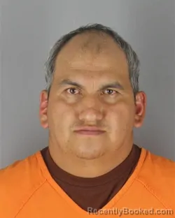 Mugshot of Clever Wilson Arcos Salazar booked in Hennepin County, Minnesota on October 8, 2026