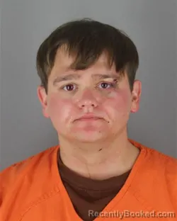 Mugshot of Tristen Tyler Tenhoff booked in Hennepin County, Minnesota on October 8, 2026