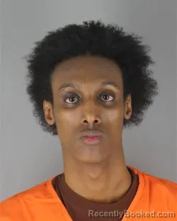 Mugshot of Hamza Osman Hersi booked in Hennepin County, Minnesota on October 8, 2026