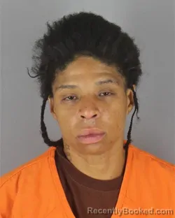 Mugshot of Precious Love Twin Dickens booked in Hennepin County, Minnesota on October 8, 2026