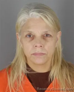 Mugshot of Jackie Ann Anderson booked in Hennepin County, Minnesota on October 8, 2026