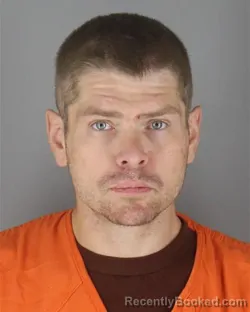 Mugshot of Jordan Thomas Mceachern booked in Hennepin County, Minnesota on October 8, 2026