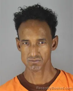 Mugshot of Liban Hassan Abdirahman booked in Hennepin County, Minnesota on October 8, 2026