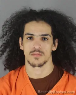 Mugshot of Abdellah Chakouri booked in Hennepin County, Minnesota on October 8, 2026