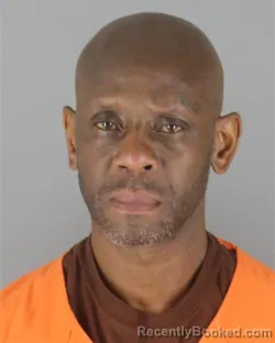 Mugshot of Sylvester Akondaye Mustin booked in Hennepin County, Minnesota on October 8, 2026