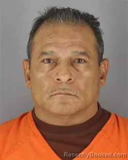 Mugshot of Ricardo Alex Chavez Alfaro booked in Hennepin County, Minnesota on October 8, 2026