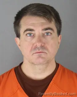 Mugshot of Brent Jeffrey Adams booked in Hennepin County, Minnesota on October 8, 2026
