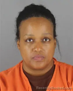 Mugshot of Martina Renee Harnesberry booked in Hennepin County, Minnesota on October 8, 2026