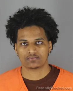 Mugshot of Kamal Madi Sheikh booked in Hennepin County, Minnesota on October 8, 2026