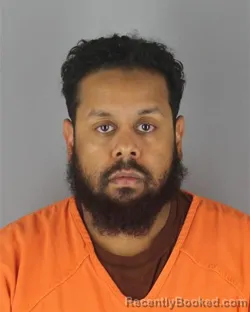 Mugshot of Mohamed Aidarus Ahmed booked in Hennepin County, Minnesota on October 8, 2026