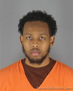 Mugshot of Diini Abdullahi Hassan booked in Hennepin County, Minnesota on October 9, 2026