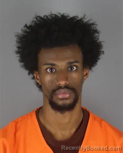 Mugshot of Abdirahman Mahamed Hassan booked in Hennepin County, Minnesota on October 9, 2026