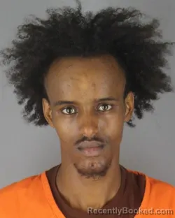 Mugshot of Zekeria Abdi Yusuf booked in Hennepin County, Minnesota on October 9, 2026