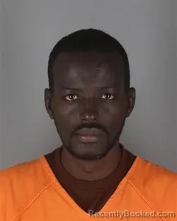 Mugshot of Mowlid Abdi Hired booked in Hennepin County, Minnesota on October 9, 2026