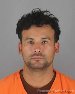 Mugshot of Elvin Octavio Moscoso Martinez booked in Hennepin County, Minnesota on October 10, 2026
