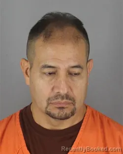 Mugshot of Rigoberto Uribe booked in Hennepin County, Minnesota on October 10, 2026