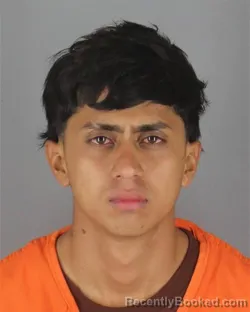 Mugshot of Ivinston Leonel Naranjo Espana booked in Hennepin County, Minnesota on October 12, 2026