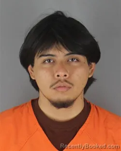 Mugshot of Brandon Imanol Santos-Ruiz booked in Hennepin County, Minnesota on October 12, 2026